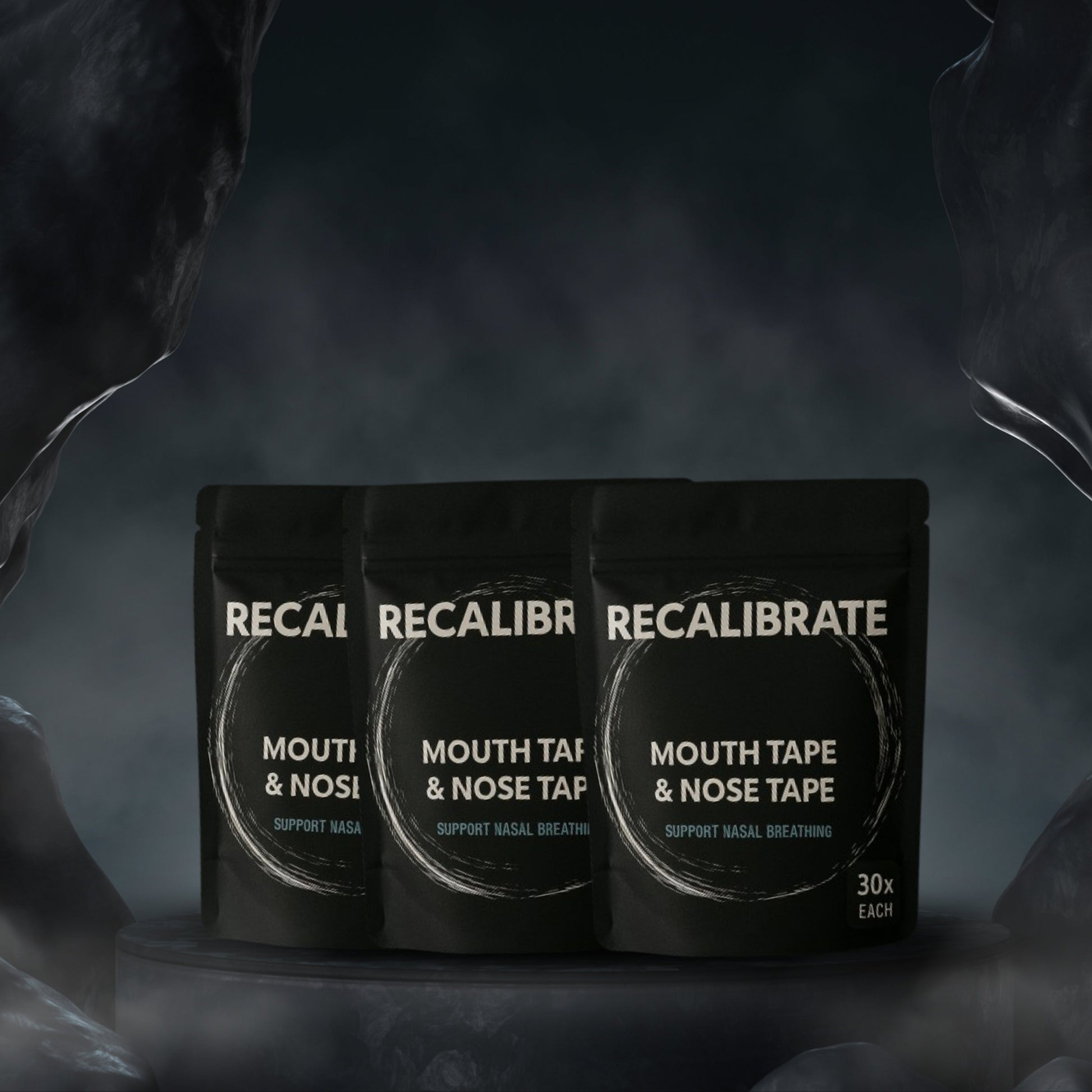 Three packages of Recalibrate Mouth Tape & Nose Tape on a dark background
